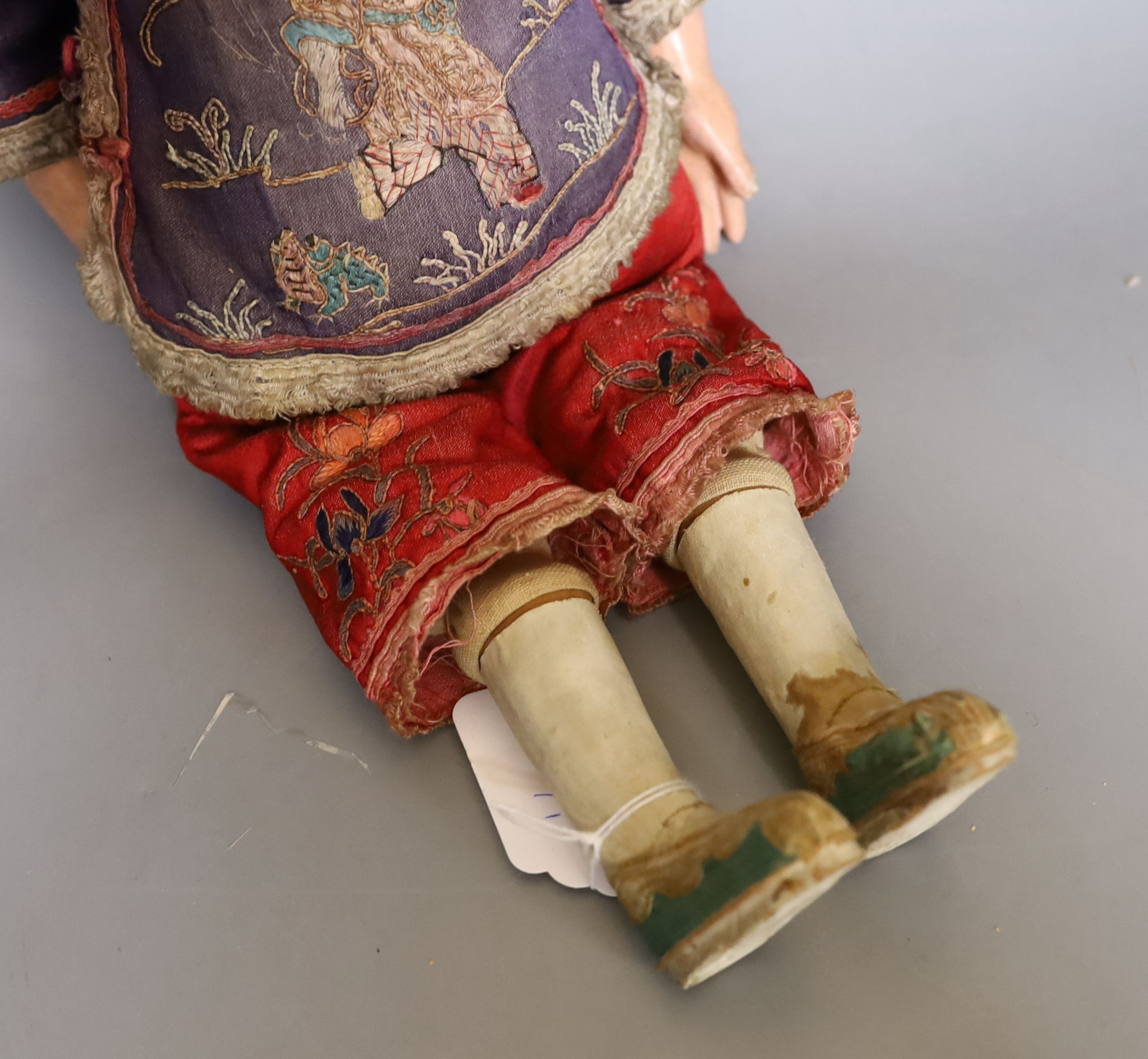 A papier mache doll, a Chinese boy in Chinese costume - 40cm high